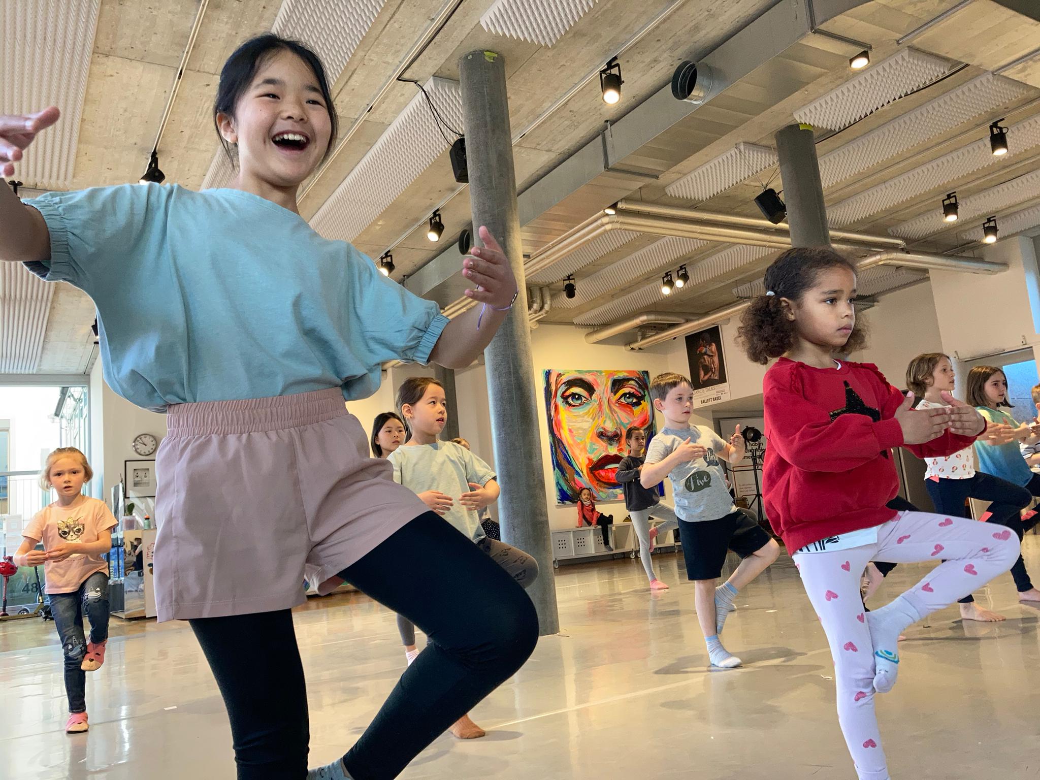 Children enjoying a joyful dance session at spring arts camp