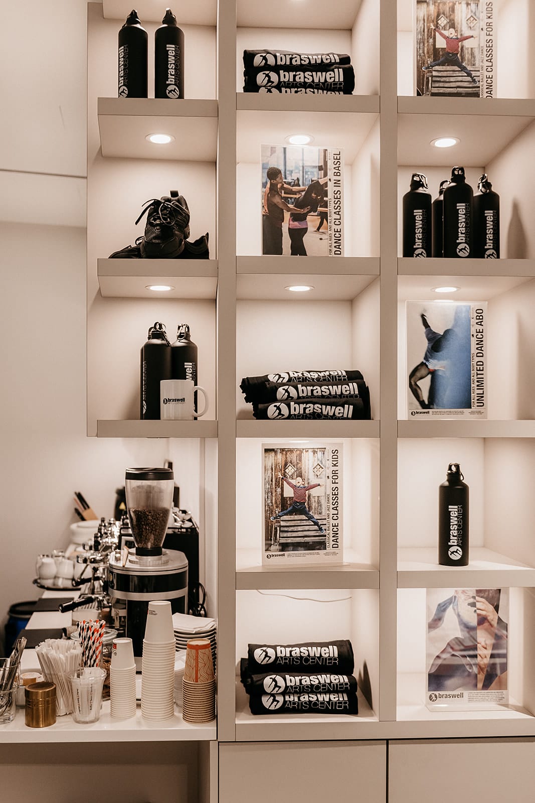 BAC dance shop display with uniforms and water bottles